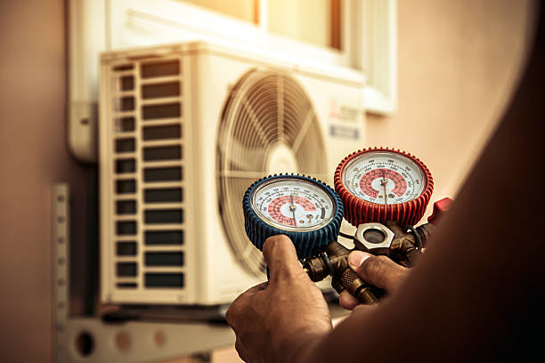 Professional Air Conditioning Service technician working in Bartlett, TN